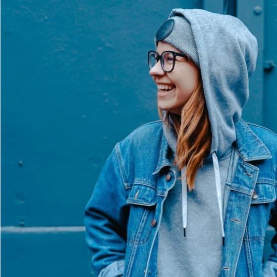 Female  smiling wearing her hoodie