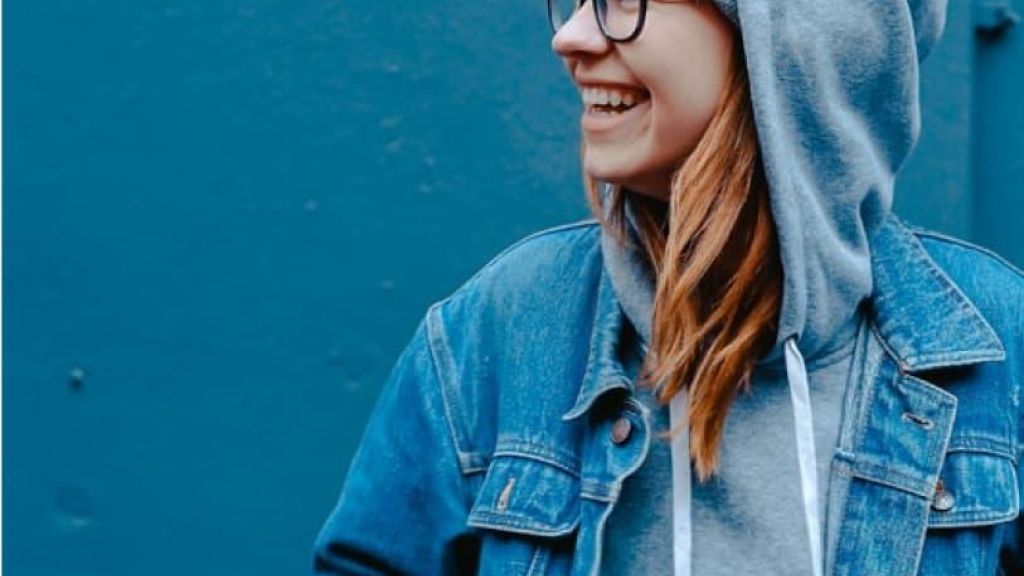 Female  smiling wearing her hoodie