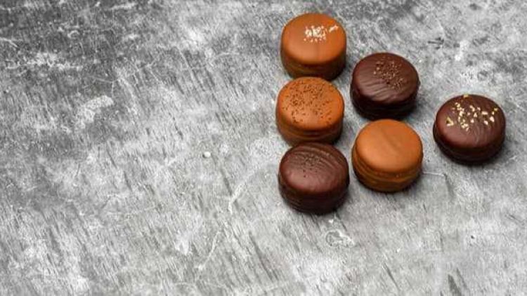 six chocolates sitting on top of a table