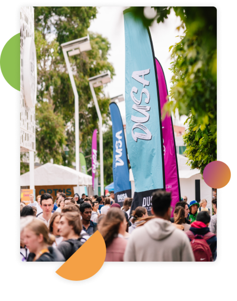 Many students mingling and walking along Morgans Walk at Burwood Campus during a DUSA event
