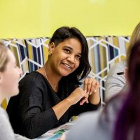 Group of people sitting together and talking